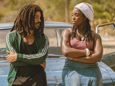 Photo shows Kingsley Ben-Adir, left, and Lashana Lynch in "Bob Marley: One Love." 
