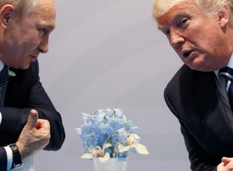 Trump, right, with Russian President Vladimir Putin at the G20 Summit in Hamburg on July 7, 2017.  