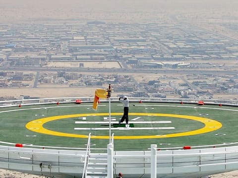 Tiger Woods hits balls from the Burj Al Arab in 2004