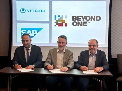 From left: NTT DATA representative, Manuel Etter, Group CFO, Beyond ONE, Marwan Zeineddine, Managing Director at SAP UAE.