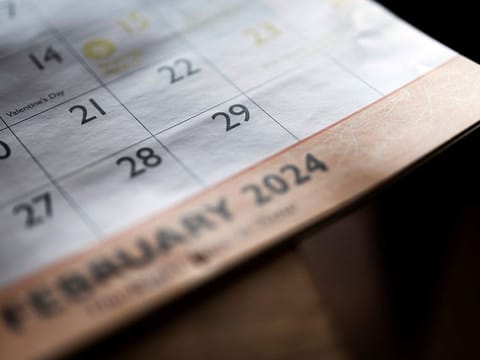 A calendar shows the month of February, including leap day, Feb. 29. 