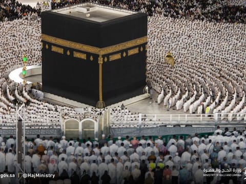 Muslim Umrah pilgrims throng the courtyard around the Holy Kaaba at the Grand Mosque in Mecca.  