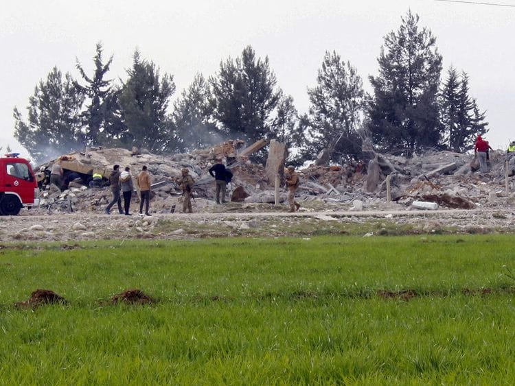 Lebanese soldiers and emergency service personnel inspect the rubble at the site of an Israeli air strike in the vicinity of Baalbek city in the central Bekaa plain on February 26, 2024.