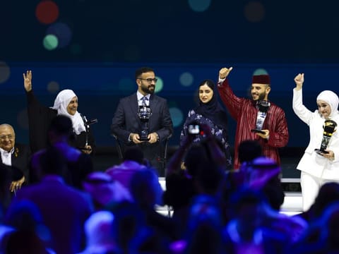 Iraqi pharmacist Tala Al Khalil, Mohamed Al Najjar from Iraq, Fathiya Al Mahmoud from Egypt and Amine Imnir from Morocco, during Arab Hope Maker awards ceremony at Coca Cola Arena in Dubai on Sunday
