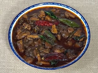 Experience Kerala's culinary delights: Savoury and spicy Mushroom Theeyal recipe