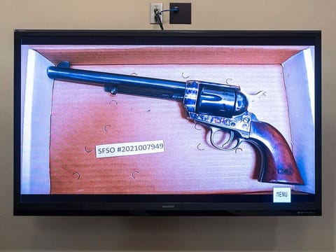 The revolver that actor Alec Baldwin was holding and fired, killing cinematographer Halyna Hutchins and wounding the film’s director Joel Souza, is displayed during the trial against Hannah Gutierrez-Reed.