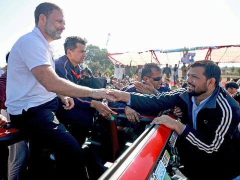 Congress leader Rahul Gandhi meets a supporter during the 'Bharat Jodo Nyay Yatra', in Ujjain