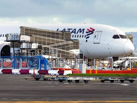 The LATAM Airlines Boeing 787 Dreamliner plane that suddenly lost altitude mid-flight a day earlier, dropping violently and injuring dozens of terrified travellers, is seen on the tarmac of the Auckland International Airport in Auckland.