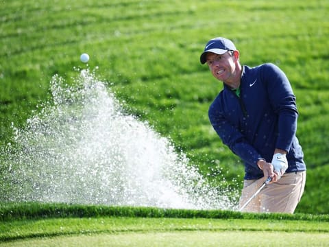 Rory McIlroy of Northern Ireland hits his shot from a bunker on the ninth hole during a practice round at TPC Sawgrass on Tuesday.