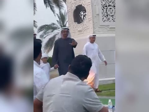 Still from video on social media showing President His Highness Sheikh Mohamed bin Zayed Al Nahyan arriving for iftar at the mosque on Sunday
