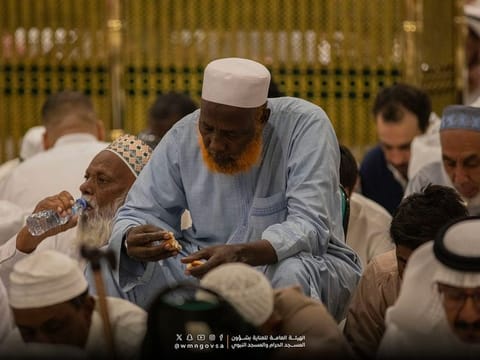 Muslims end their fast at the Prophet’s Mosque in Medina. 