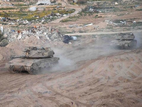 Israeli tanks manoevre in the Gaza Strip, as Tel Aviv continues its onslaught in the besieged enclave 
