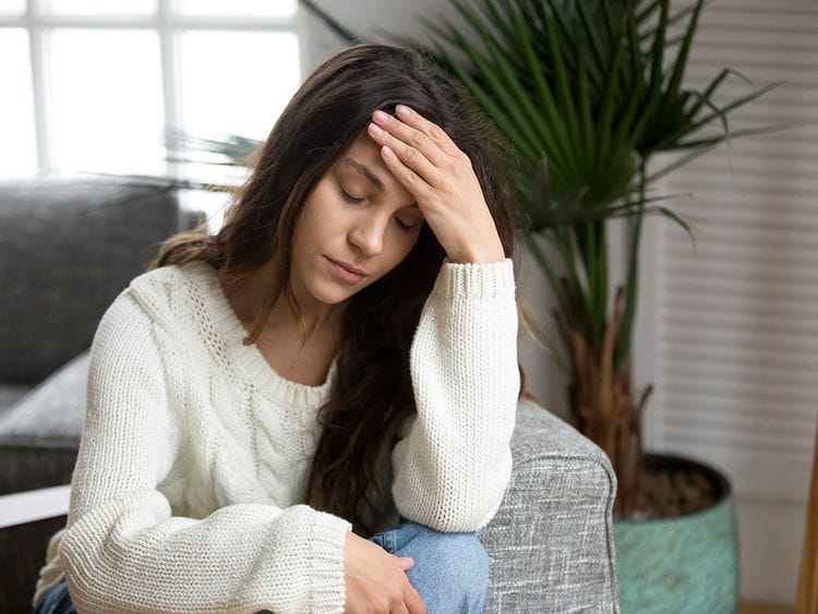Woman being ill