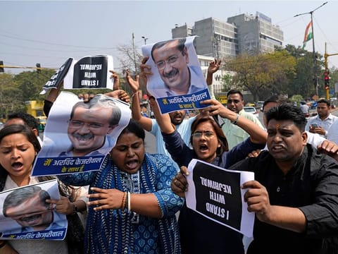 Supporters of Aam Admi Party, or Common Man's Party, shout slogans during a protest against the arrest of their party leader Arvind Kejriwal, in New Delhi, India, Friday, March 22, 2024.  