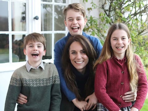 This undated photo issued on Sunday March 10, 2024 by Kensington Palace shows Kate, Princess of Wales with her children, Prince Louis, left, Prince George and Princess Charlotte, taken in Windsor, England