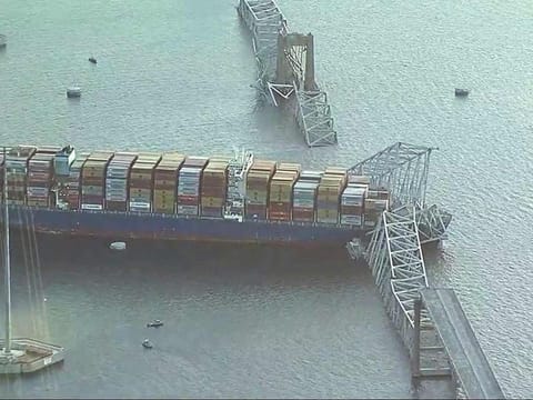 Parts of the Francis Scott Key Bridge remain after a container ship collided with one of the bridge’s support Tuesday, March 26, 2024 in Baltimore. The major bridge in Baltimore snapped and collapsed after a container ship rammed into it early Tuesday, and several vehicles fell into the river below.  