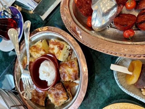 Su Boregi (left) and Sujuk. Turkish food is a fusionof Central Asian, Middle Eastern, Mediterranean, Eastern European, and Balkan cuisines.