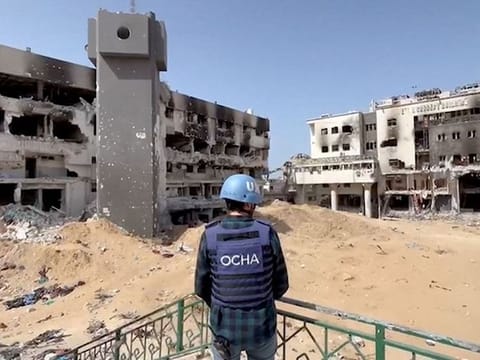 Jonathan Whittall, an OCHA official, stands near the destroyed Al Shifa Hospital during an assessment by a UN Convoy, amid the ongoing conflict between Israel and Hamas, in Gaza City, April 5, 2024, in this screen grab taken from a handout video.  