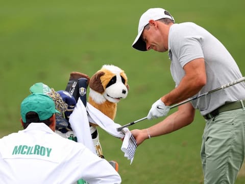 Rory McIlroy of Northern Ireland prepares to warm up in the practice area prior to the 2024 Masters Tournament at Augusta National Golf Club on Tuesday.