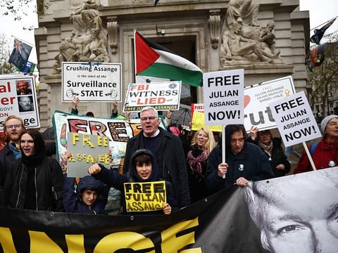 Kristinn Hrafnsson (centre) editor-in-chief of WikiLeaks joins supporters of WikiLeaks founder Julian Assange protest outside the Australian High Commission in central London on April 10, 2024, on the eve of the fifth anniversary of his arrest by British police. 