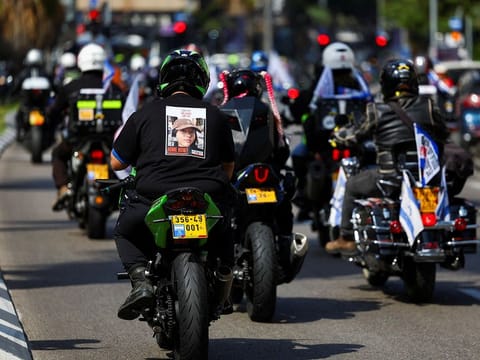 People participate in 'Ride for Hope', an event where people ride motorcycles across the country in support of hostages kidnapped in the deadly October 7 attack on Israel by the Palestinian Islamist group Hamas from Gaza, as the conflict between Israel and Hamas continues, in Tel Aviv, Israel, April 12, 2024. 