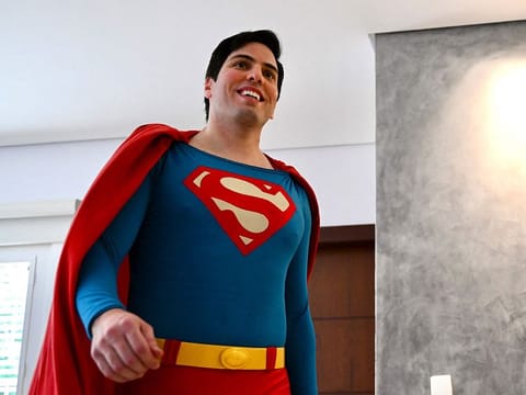 Leonardo Muylaert, 36, known as the Brazilian Superman, gets ready at his office before visiting a retirement home in Brasilia, Brazil, on April 9, 2024. Muylaert, a lawyer who didn’t have social media one year ago, found out a video of him visiting an event went viral on TikTok, calling him the "Brazilian Superman." He liked the idea and jumped on a Superman costume, and since then, he has been traveling around Brazil as Superman. 