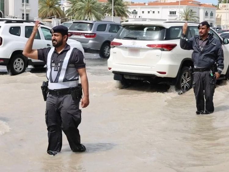 ad-police-manage-traffic-after-rain-1713352869872