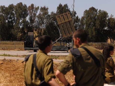 Israeli soldiers at an Iron Dome anti-missile battery site near the Gaza border in southern Israel, on Wednesday, April 17, 2024.  