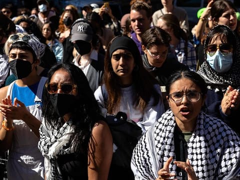 New York University students set up a "Liberated Zone" tent encampment in Gould Plaza at NYU Stern School of Business on April 22, 2024 in New York City.  