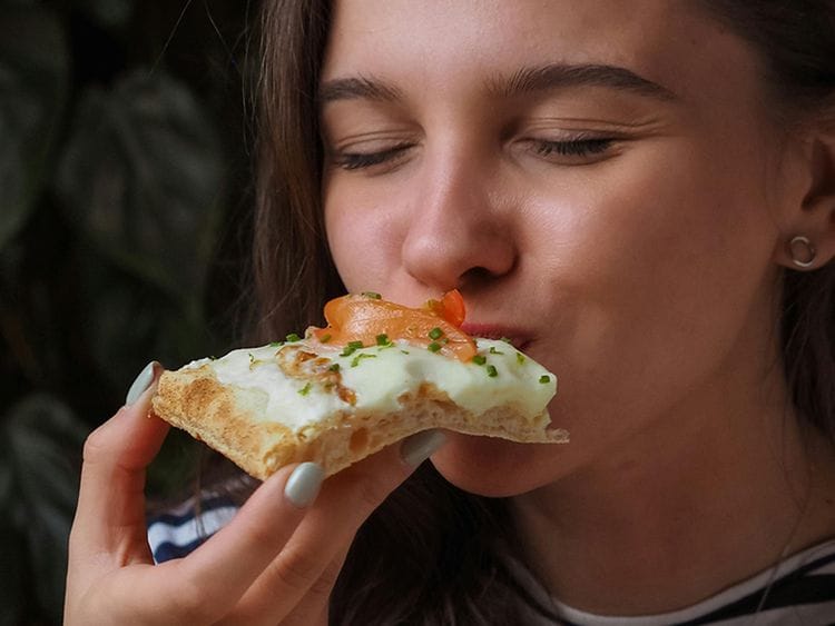 Eating pizza