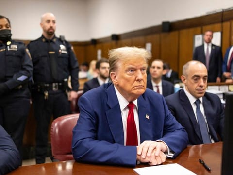 Former US President Donald Trump attends his trial for allegedly covering up hush money payments linked to extramarital affairs, at Manhattan Criminal Court in New York City, on April 30, 2024.  