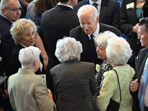 US President Joe Biden greets Holocaust survivors during the annual Days of Remembrance ceremony for Holocaust survivors at the US Capitol in Washington, DC, on May 7, 2024.  