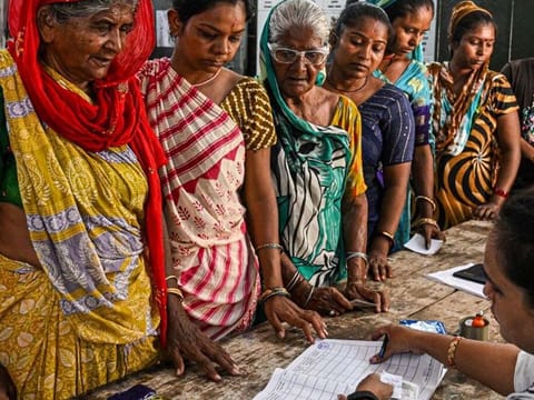 Women voters register at a polling station during the third phase of voting for national elections in Ahmedabad, Gujarat, India, on Tuesday, May 7, 2024.  in September this year, the Union Cabinet approved the ‘One Nation, One Election’ proposal, which aims to hold simultaneous Lok Sabha and Assembly elections, along with urban body and panchayat polls, within a span of 100 days.