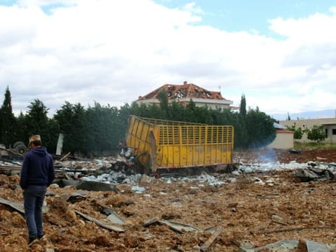 A man inspects the scene of an overnight Israeli air strike that targeted an area near the Bekaa Valley city of Baalbek, around 80 kilometres from the Israel-Lebanon frontier, on May 6, 2024.  