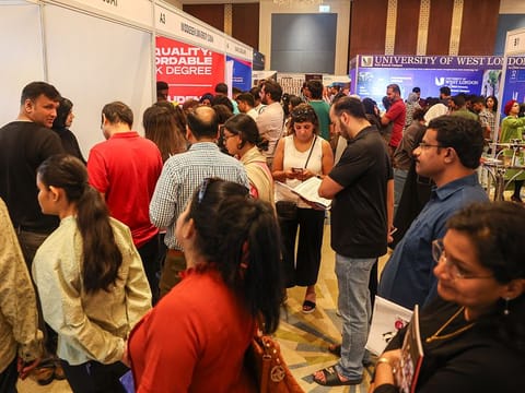 Crowds queue up at the exhibitor booths on Day 2 of Edufair