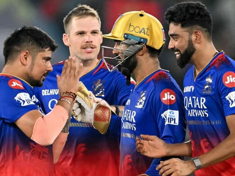 A RARE MOMENT OF CELEBRATION: Royal Challengers Bengaluru’s players rejoice after the dismissal of Rajasthan Royals’ captain Sanju Samson during the Indian Premier League eliminator cricket match in Ahmedabad on May 22, 2024. Rajasthan won by four wickets with six balls remaining. 