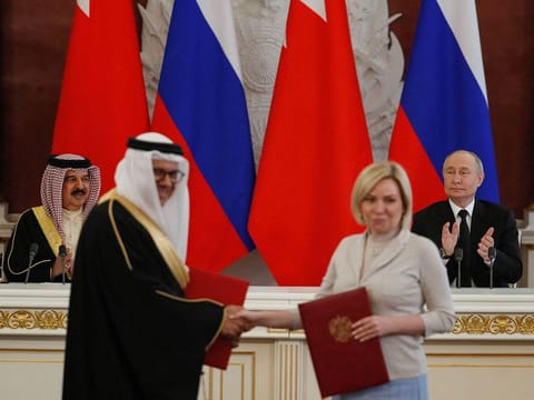 King Hamad Bin Eisa Al Khalifa and Russian President Vladimir Putin attend the signing of documents ceremony during their meeting at the Kremlin in Moscow on May 23, 2024.  
