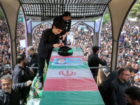The coffin of the late Iranian president Ebrahim Raisi during a funeral procession in the eastern city of Birjand on May 23, 2024.  