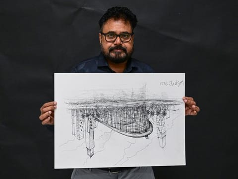 PR Judson with a detailed sketch of Dubai Opera, which he drew upside-down from memory in just 1.5 hours during a live demo at Gulf News in Dubai