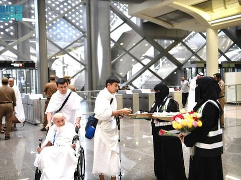 Volunteers welcome and assist pilgrims for the Hajj. Around 1.1 million pilgrims from abroad arrived in Saudi Arabia  until Monday to perform the Hajj in and around the holy city of Mecca.