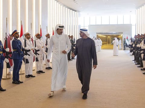 President His Highness Sheikh Mohamed bin Zayed Al Nahyan (R) and Emir of Qatar Sheikh Tamim bin Hamad Al Thani upon his arrival at the Presidential Flight in Abu Dhabi on Sunday
