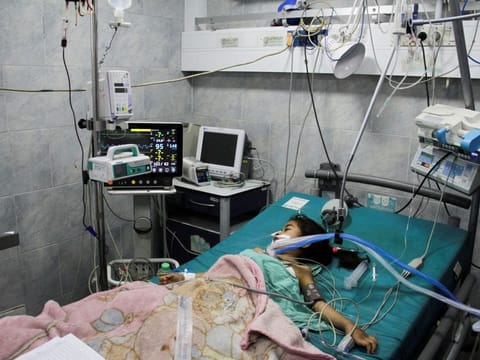 A Palestinian child, who is suffering from malnutrition, receives healthcare at Kamal Adwan Hospital in northern Gaza Strip.