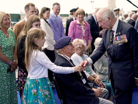 Britain's King Charles III  meets D-Day veteran Eric Bateman and members of his family, following the UK's national commemorative event to mark the 80th anniversary commemorations of Allied amphibious landing (D-Day Landings) in France in 1944, in Southsea Common, southern England, on June 5, 2024.  