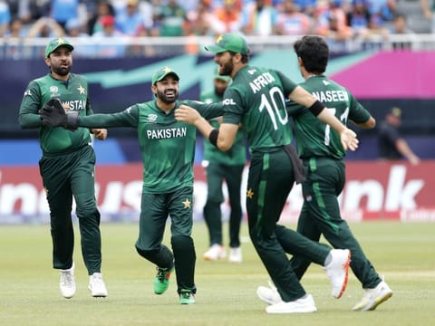 Pakistan's Naseem Shah and teammates celebrate the dismissal of India's Virat Kohli during their Group A match in in New York on Sunday.