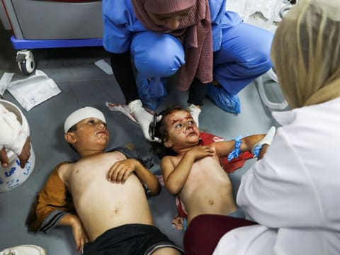 Wounded Palestinian children are taken care of, after an Israeli strike, amid the Israel-Hamas conflict, at Al Aqsa Martyrs Hospital in Deir Al Balah, in the central Gaza Strip, June 9, 2024.  