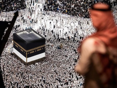 Worshippers walk around the Kaaba at the Grand Mosque in Saudi Arabia's city of Mecca during the Hajj.