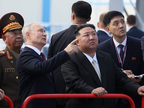 Russia's President Vladimir Putin (centre left) and North Korea's leader Kim Jong Un (centre right) visit the Vostochny Cosmodrome in Amur region on September 13, 2023.  