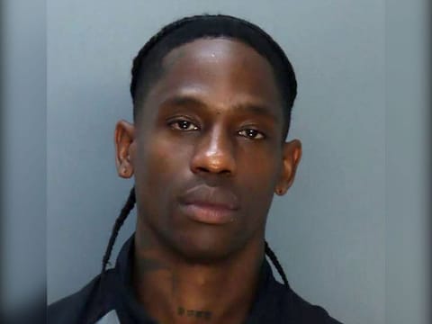 This June 20, 2024, booking photo obtained from the Miami-Dade County Corrections and Rehabilitation in Miami, Florida, shows Jacques Bermon Webster II, known professionally as Travis Scott, US rapper, singer, songwriter, and record producer.