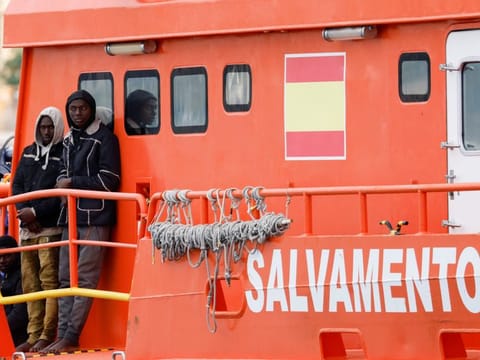 A migrant waits to disembark from a Spanish coast guard vessel at the port of Arguineguin, on the island of Gran Canaria, Spain, June 6, 2024.  Spain is one of the main gateways for migrants seeking a better life in Europe, with the vast majority making the perilous journey to try and reach the Canary Islands which lie off the northwestern coast of Africa.