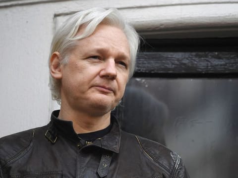 Wikileaks founder Julian Assange speaks on the balcony of the Embassy of Ecuador in London on May 19, 2017. 
